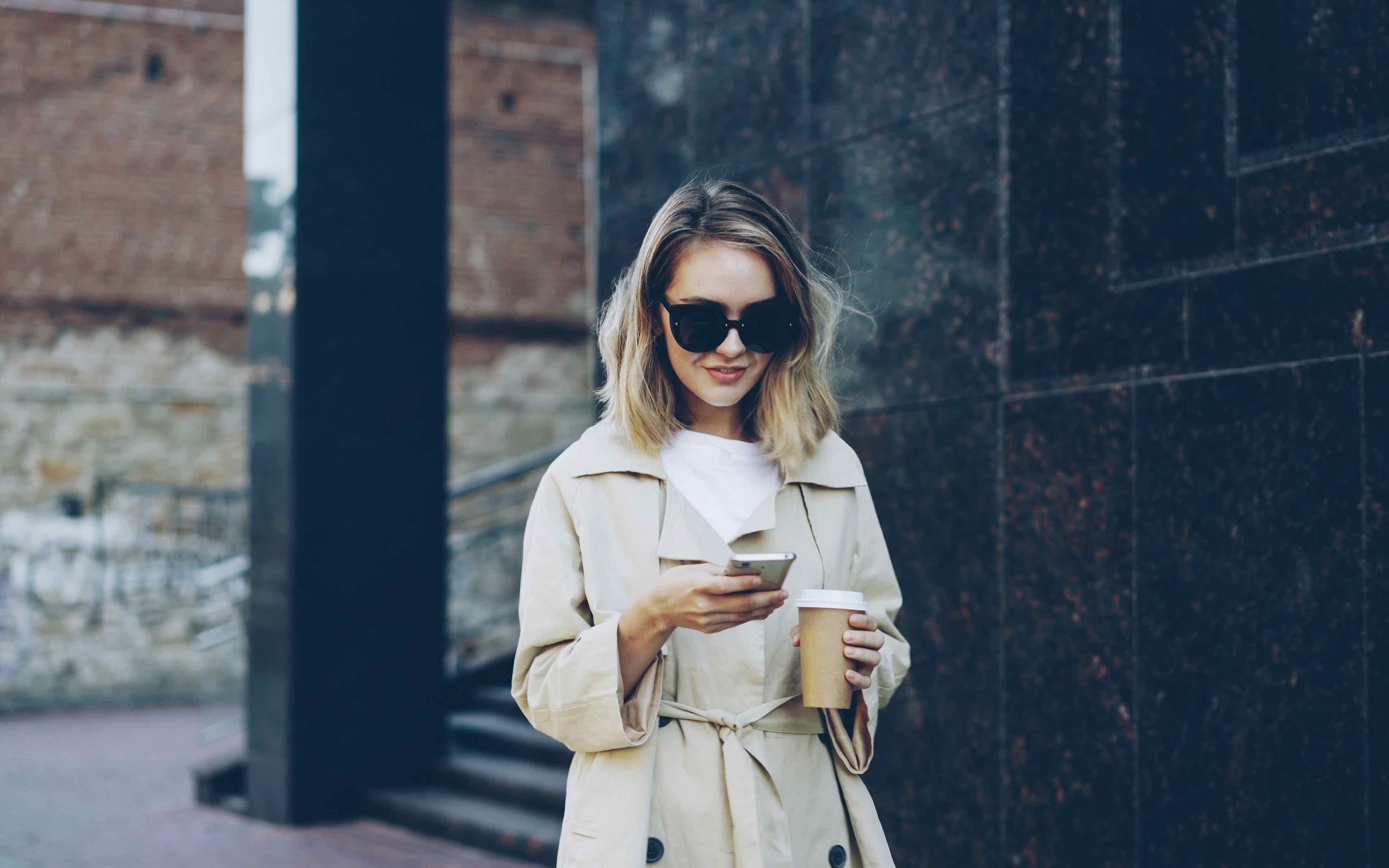 Person reviewing flashcards during morning coffee